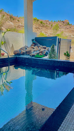 Clear blue private pool on a sunny day